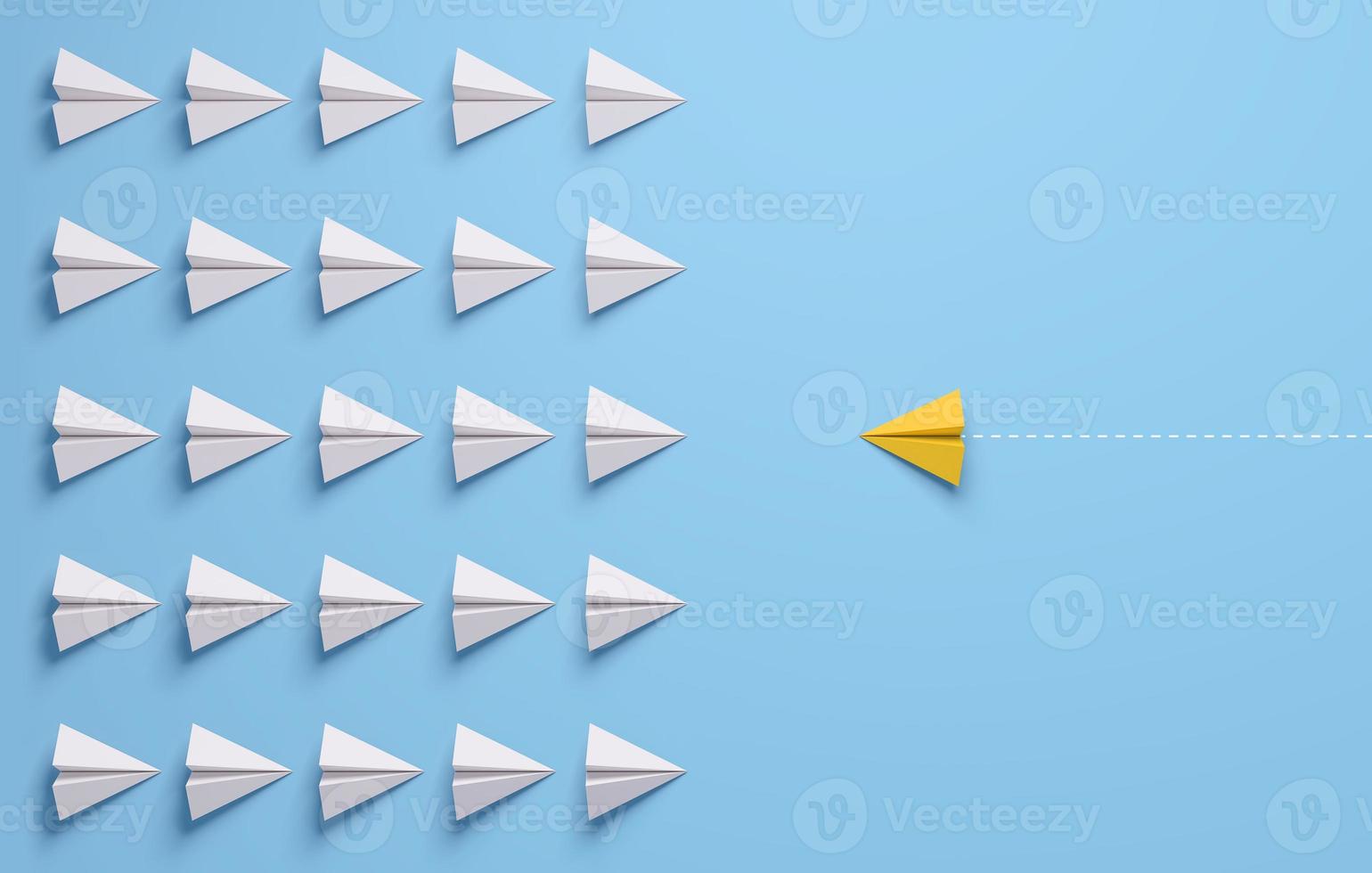 Paper airplanes face to face in battle formation. A confrontation yellow lead. Change concepts. photo