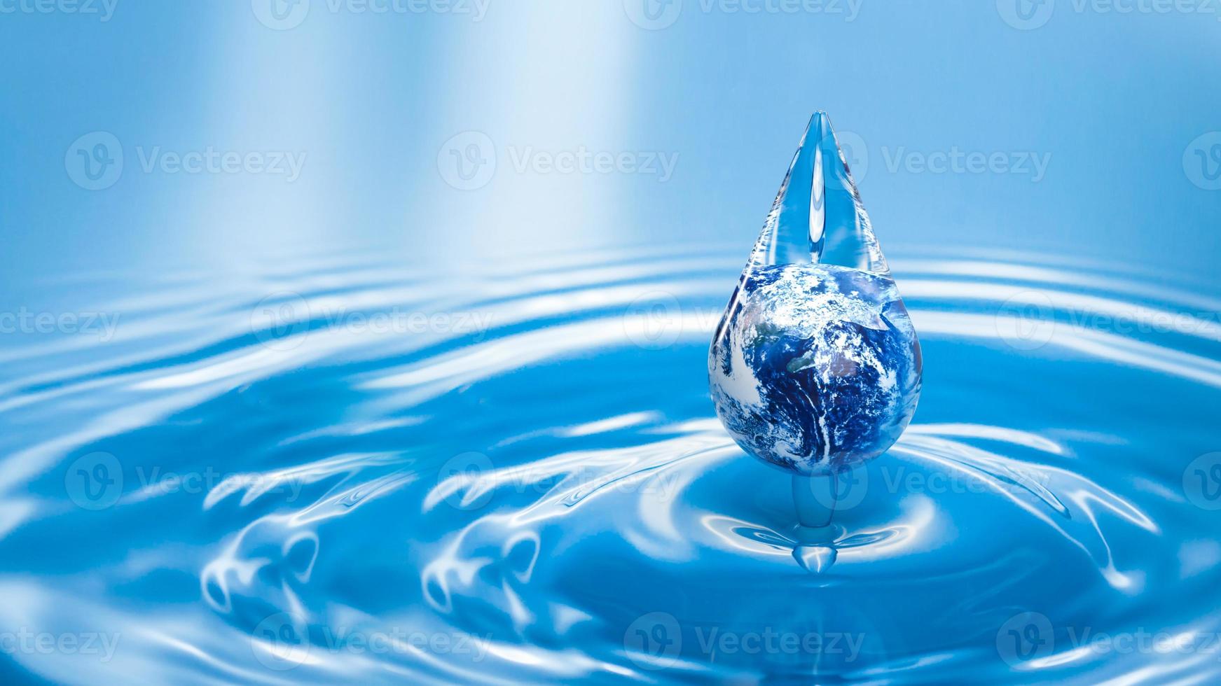 earth in water drop for ecology concept 3d rendering photo