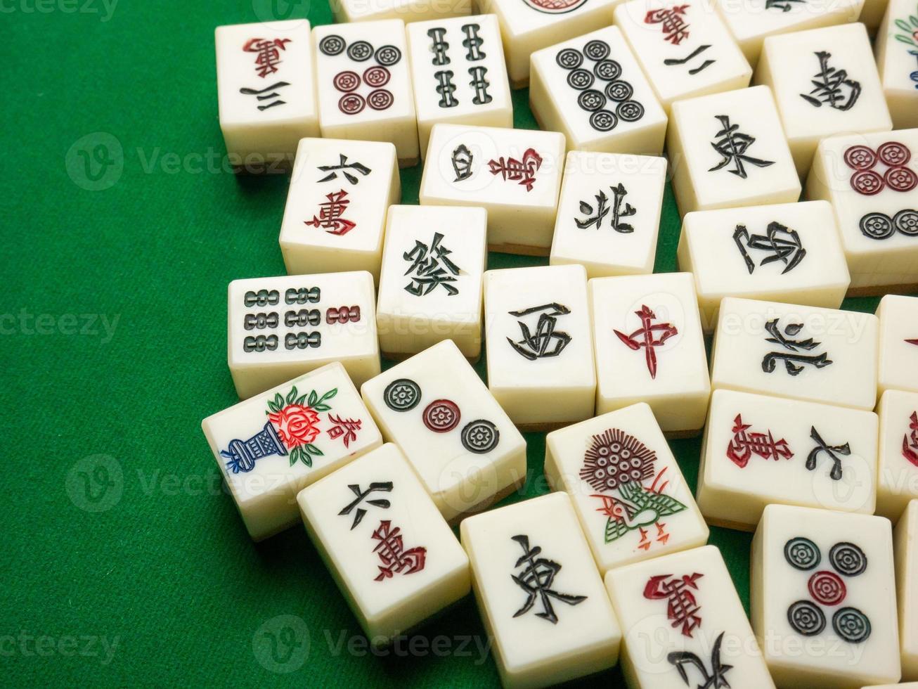 The mahjong on table ancient asian board game close up image photo