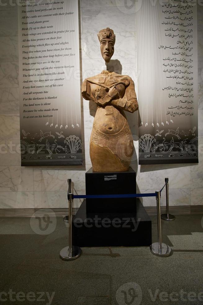 large statue of the 18th dynasty Pharaoh Akhenaten at Egypt's new National Museum of Egyptian Civilization ,NMEC, in the Fustat district of Old Cairo photo