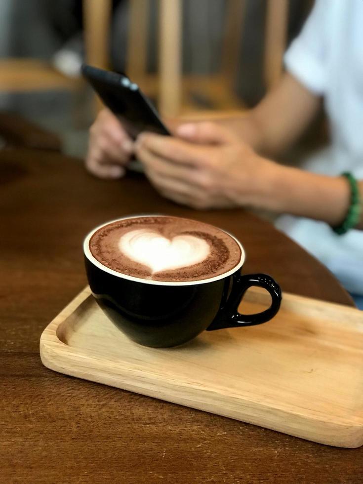 Heart latte art coffee cup photo