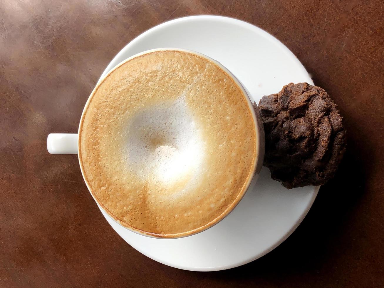 Hot coffee cup on table photo