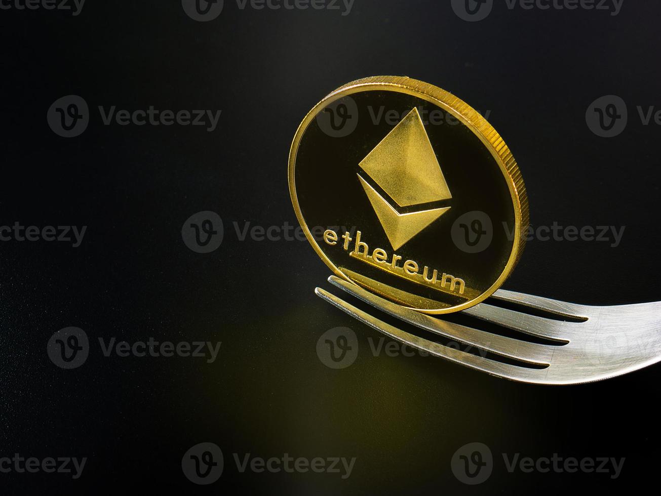 Ethereum coin and  fork  for Hard Fork cryptocurrency concept photo