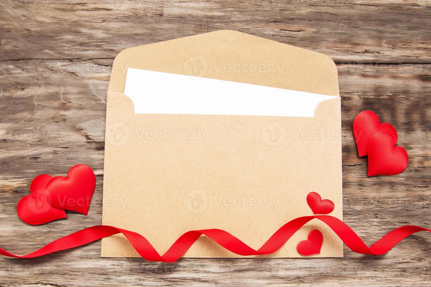 Envelope with red fabric hearts photo