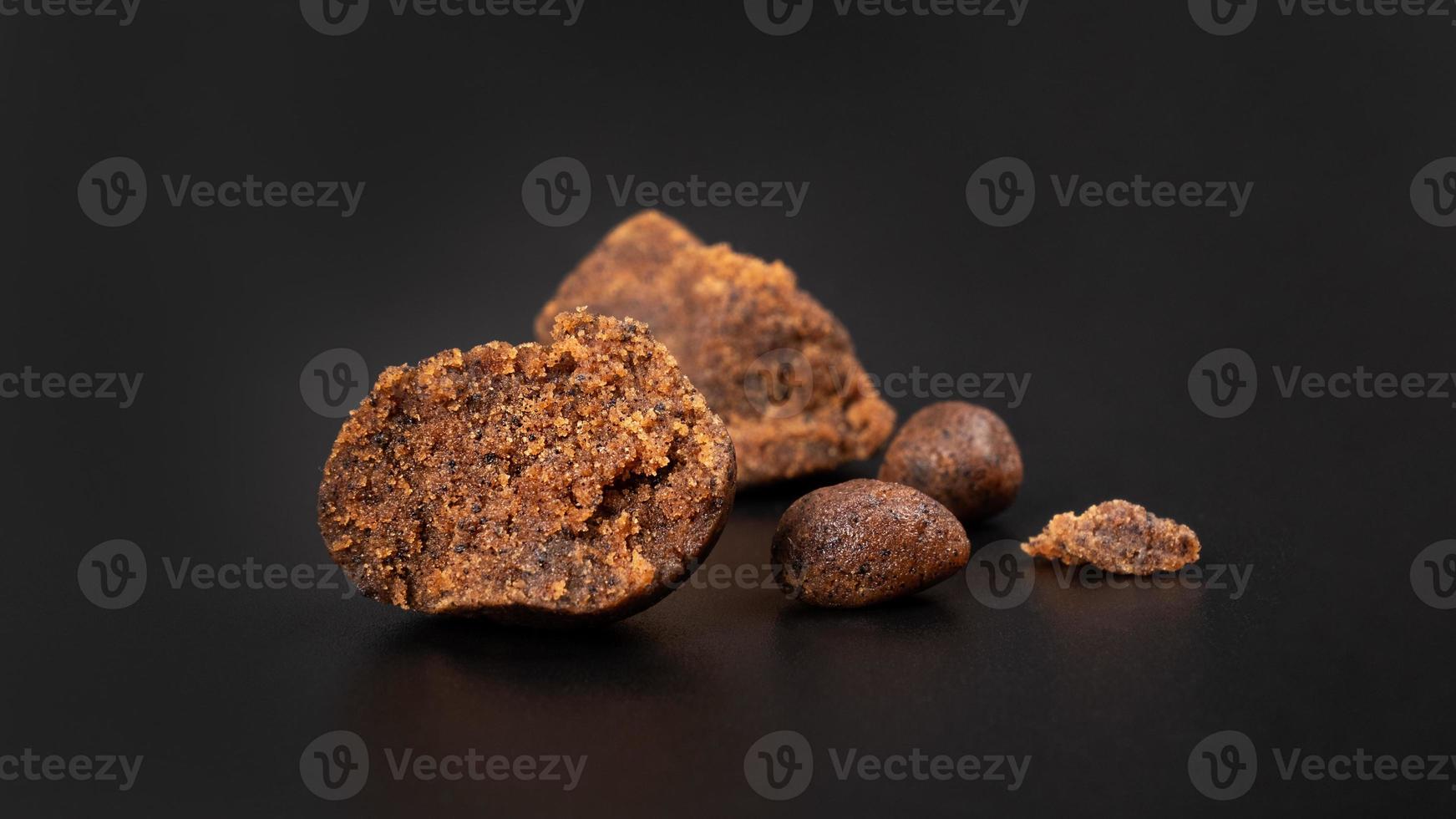 cannabis concentrate on black background, marijuana hashish photo