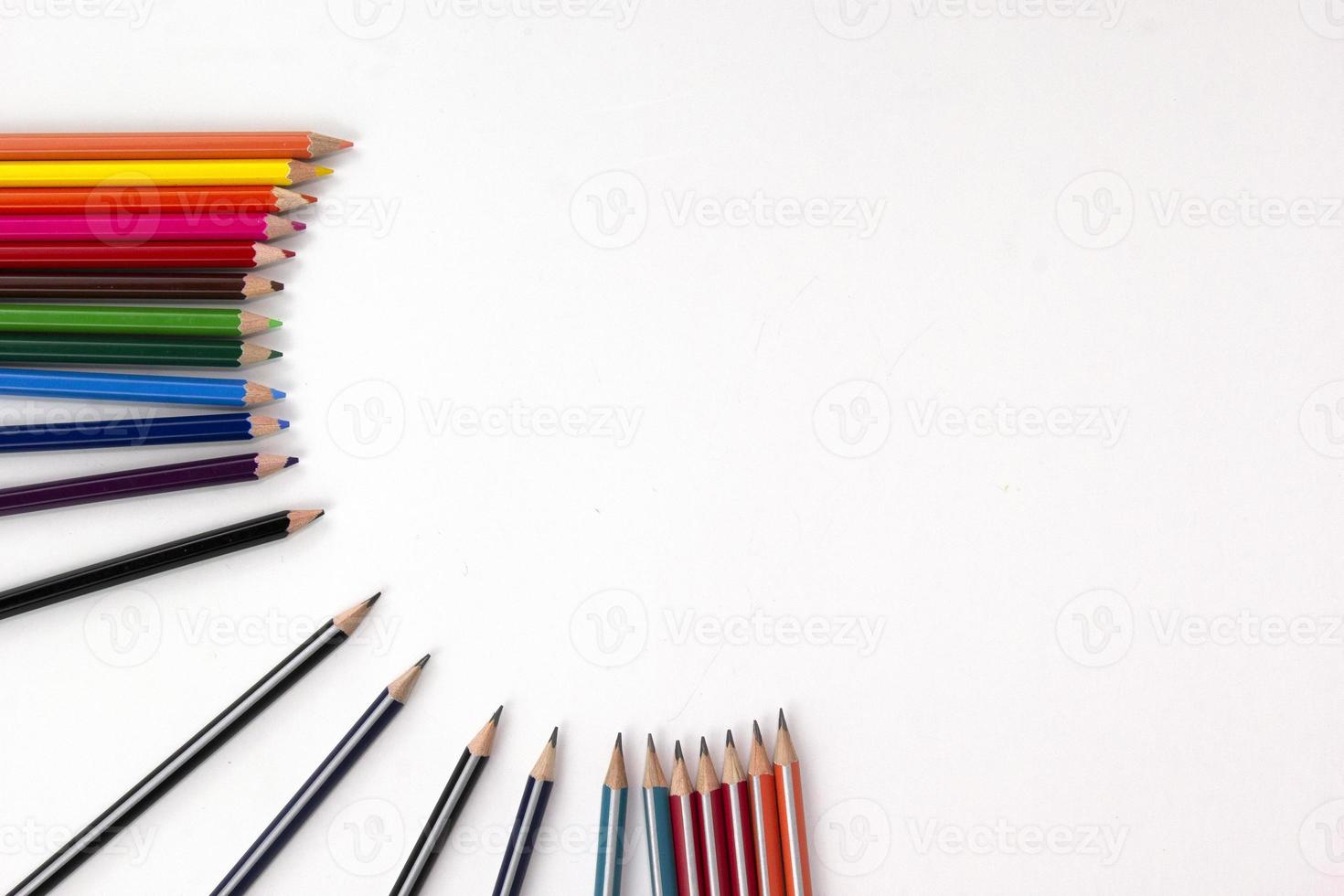 Creative Color pencils position on white backgroup. used in Back to school concept. Top view of multi-color pencils isolated on white background design photo