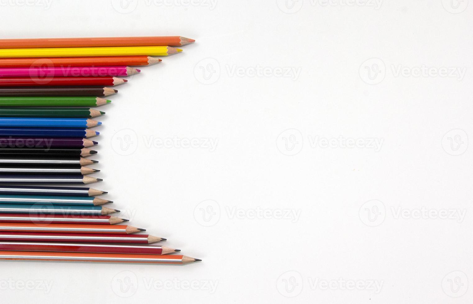 Color pencils on white backgroup. used in Back to school concept for Modern design. Top view of multi color pencils isolated on white background photo