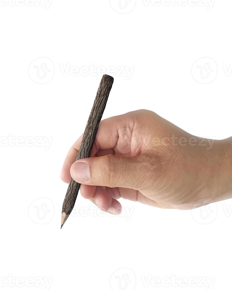 Isolated pencil in hand on a white background photo