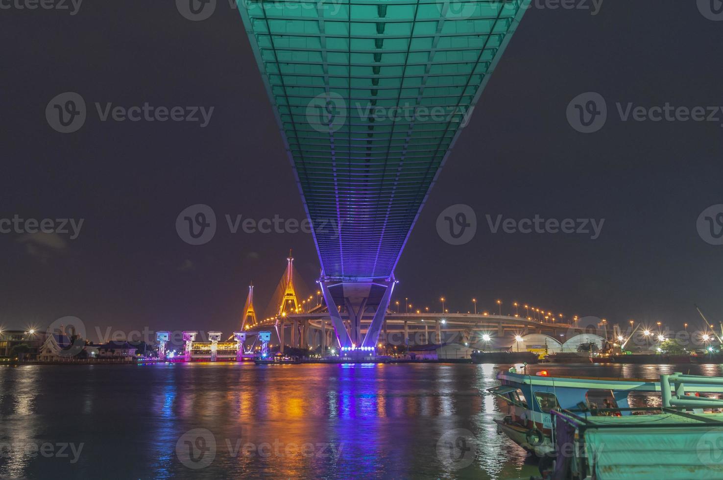 Bhumibol Bridge, Chao Phraya River Bridge. Turn on the lights in many colors at night. photo