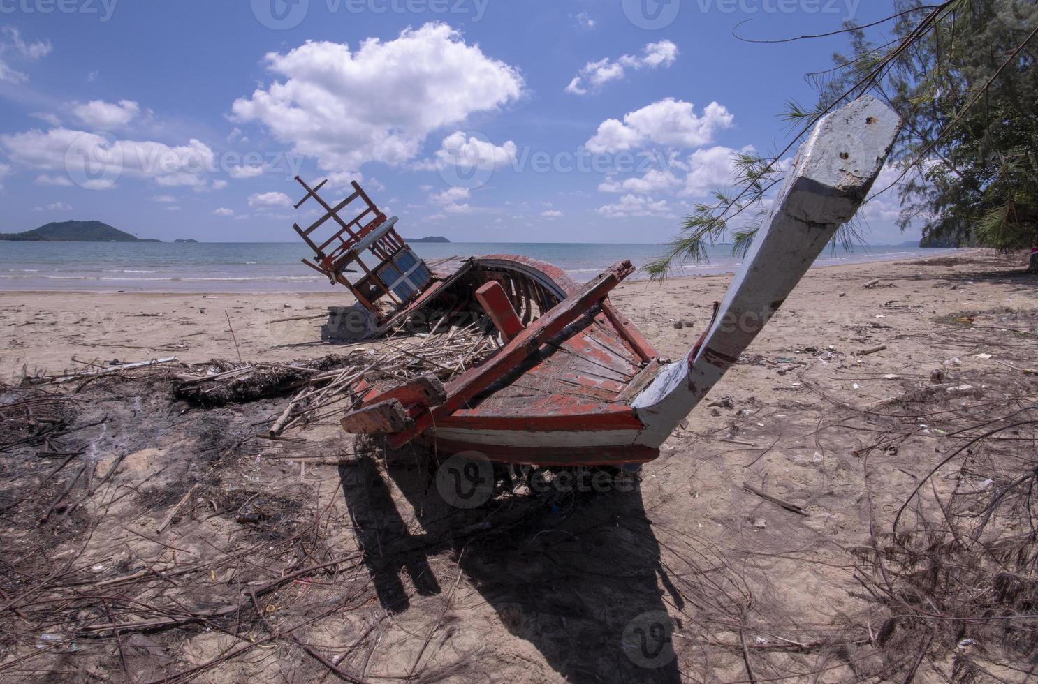 Storm damage. Fishing boat are damaged. Boat collapsed. photo