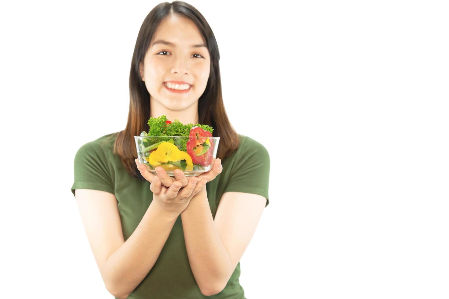 Happy lady holding kichen stuff over copy space background - people home made food preparation concept photo