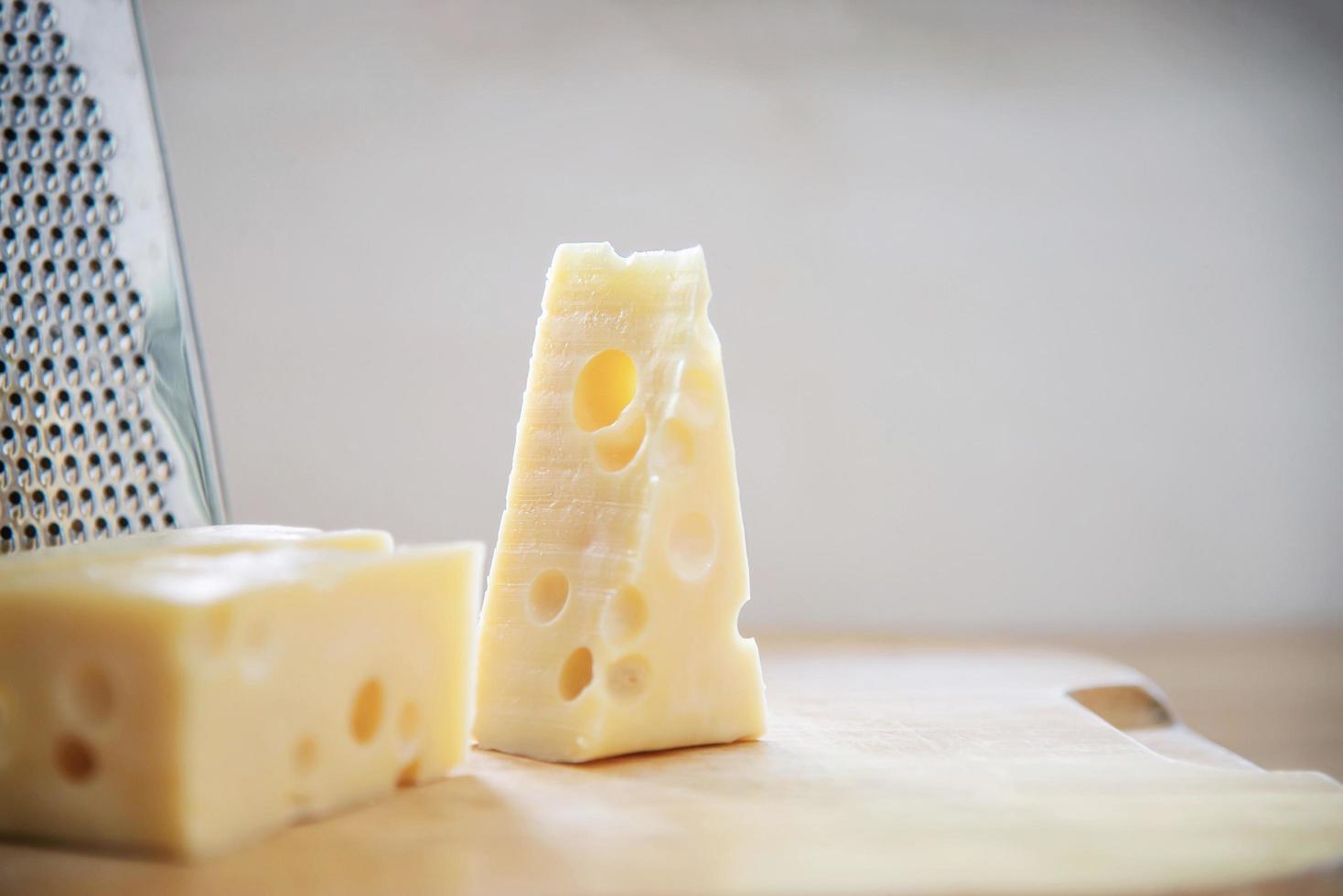 Beautiful cheeses in the kitchen - cheese food preparing concept photo