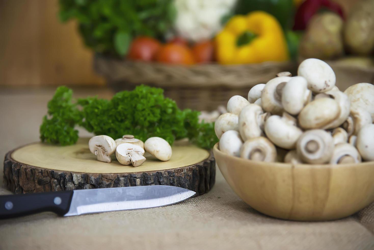 Fresh champignon mushroom vegetable in the kitchen - fresh mushroom vegetable cooking concept photo