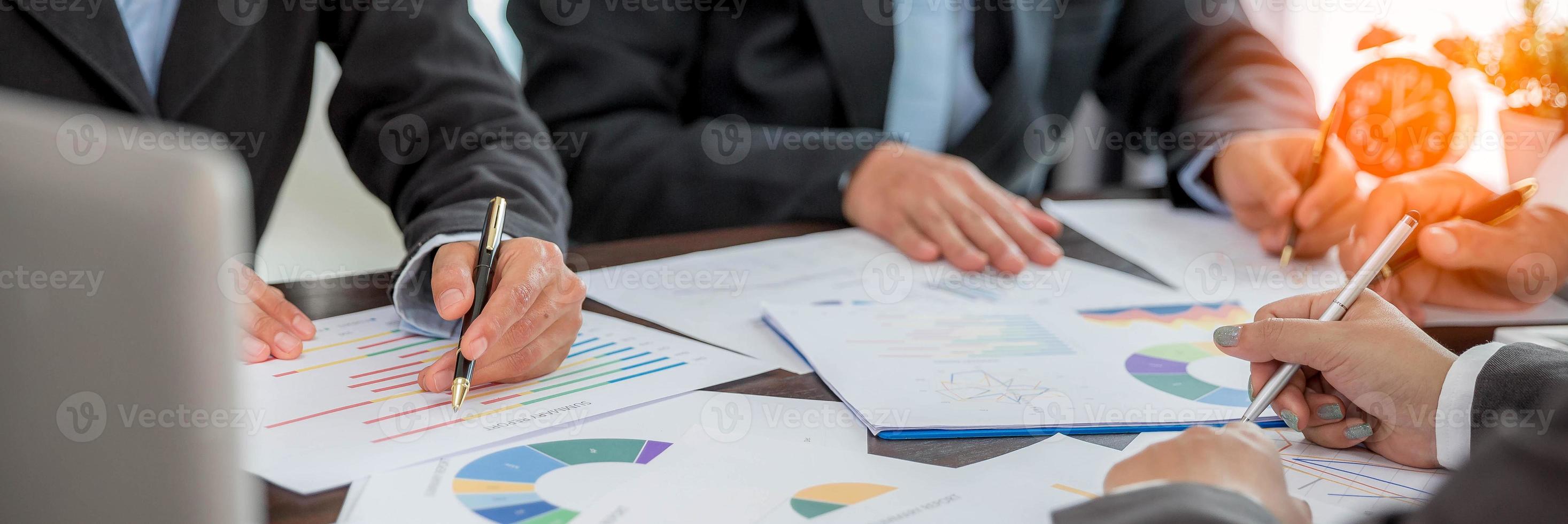 Banner of Group professional business people person working together analyze in office, work together to discuss company financial statistics report, brainstorm ideas graph datum documents on table. photo