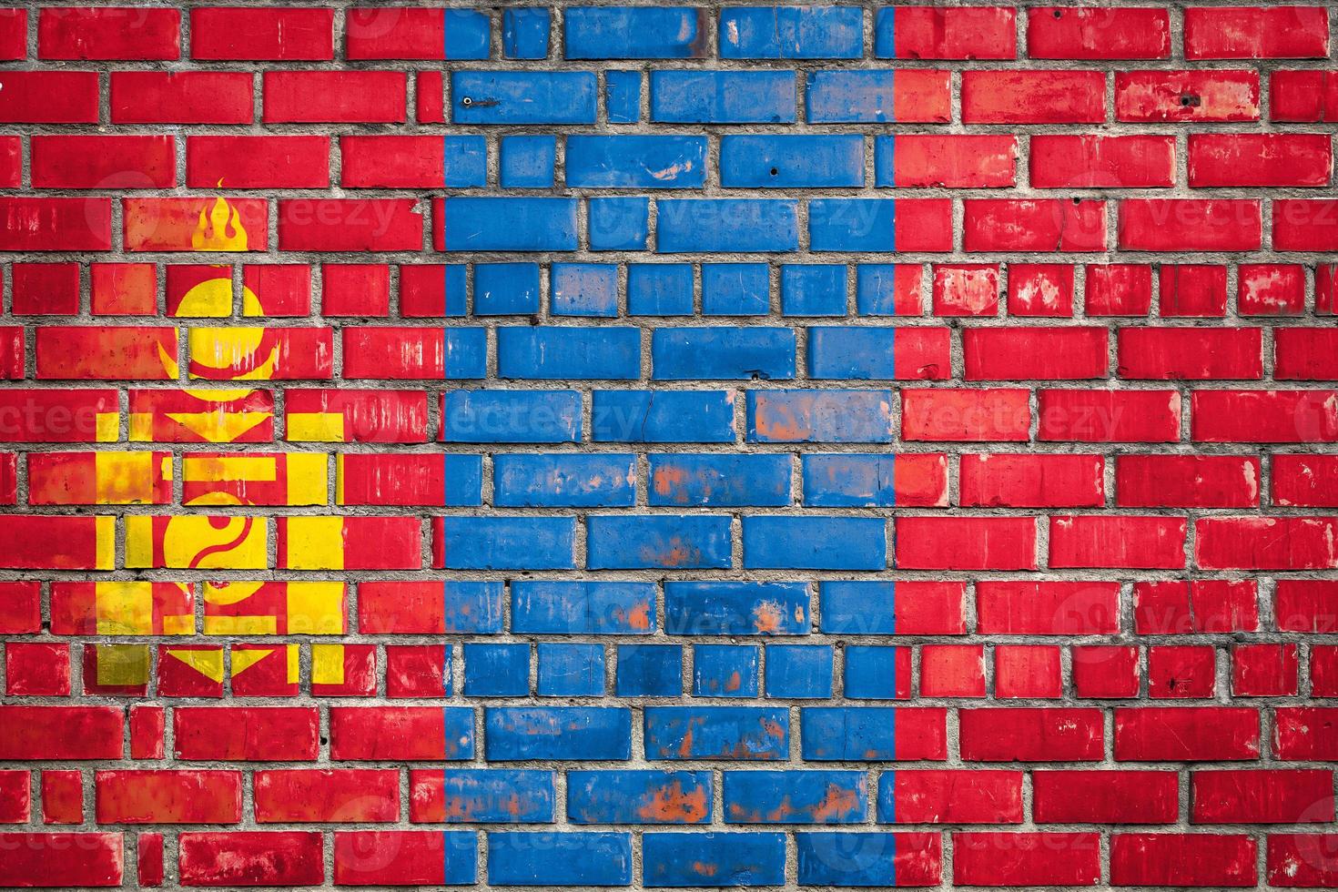 National  flag of the  Mongolia on a grunge brick background. photo
