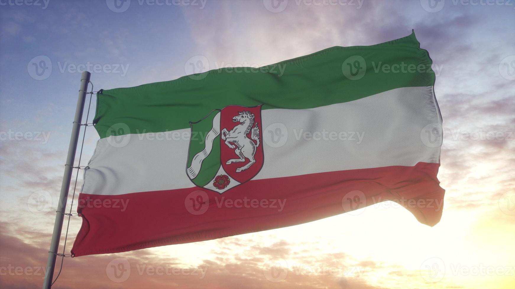 North Rhine-Westphalia flag, Germany, waving in the wind, sky and sun background. 3d illustration photo