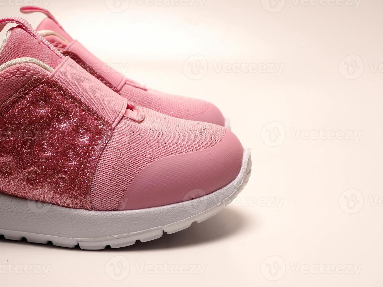 Closeup shoot pair of pink girl shoe photo