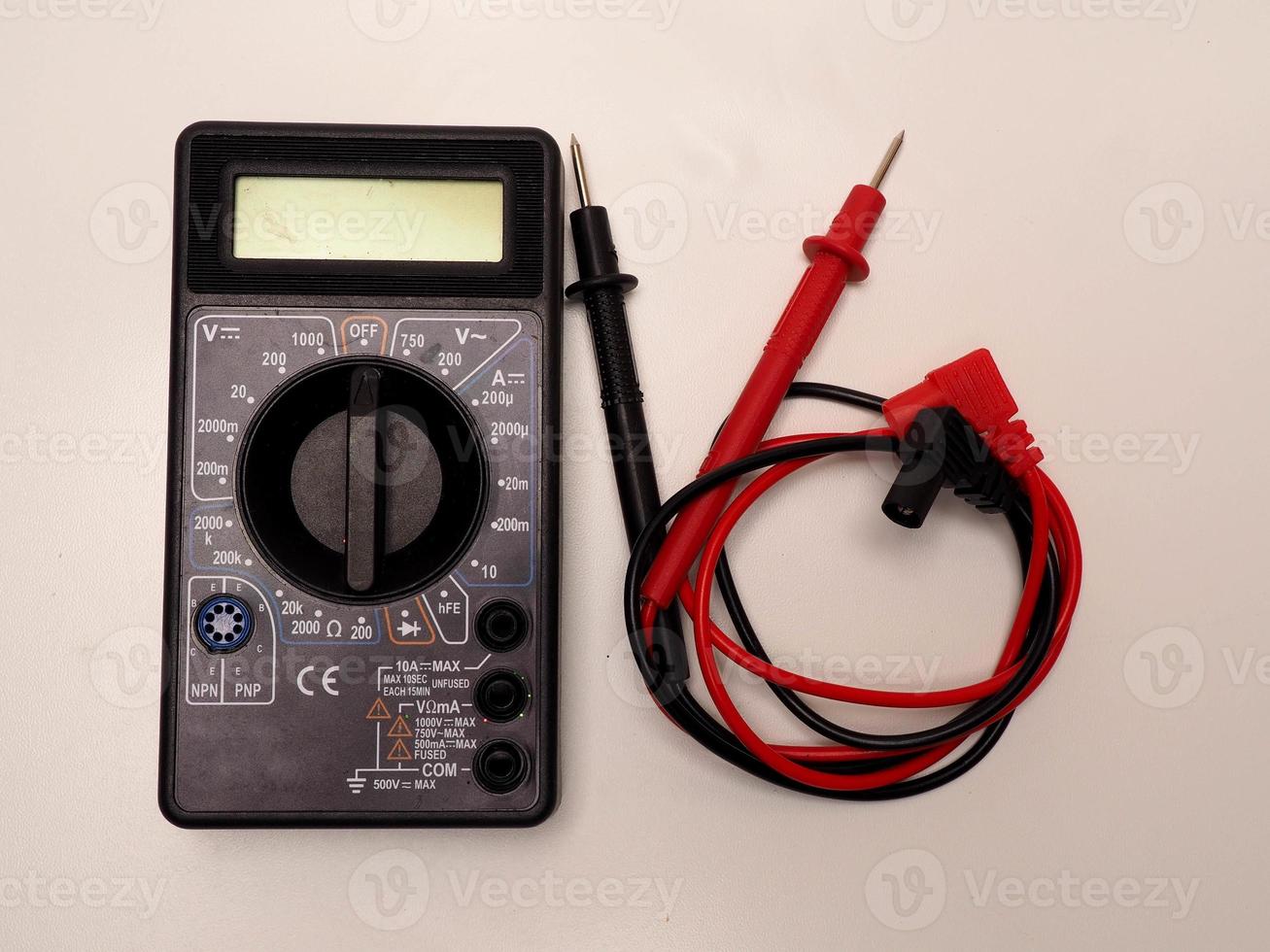 Picture of black digital multimeter or AVO meter for measuring electrical stuff such as voltage, resistance, and current photo