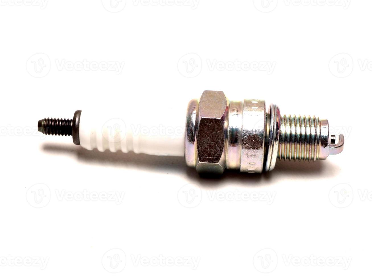 Close up shoot of white spark plugs photo