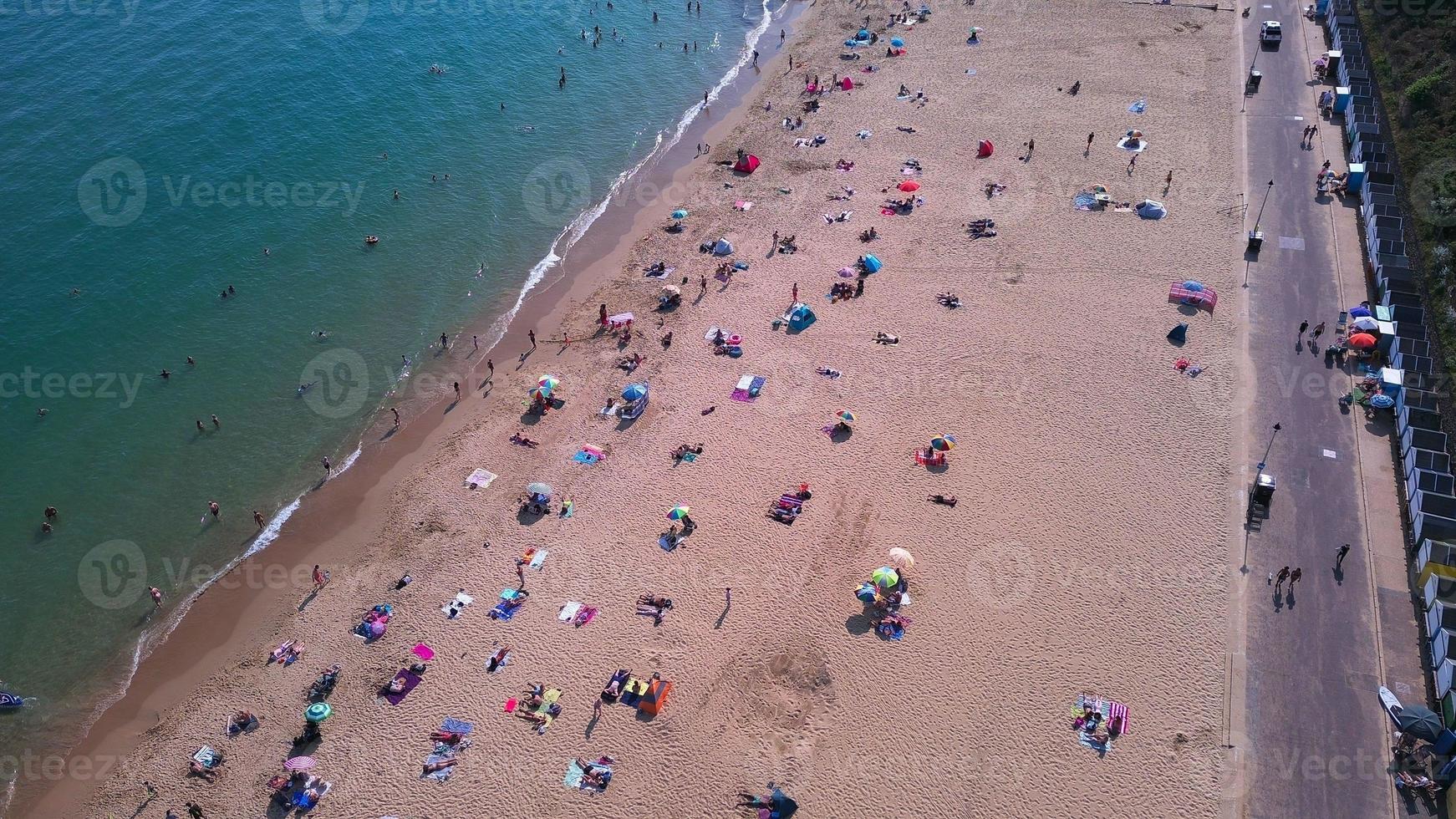 People relaxing at Bournemouth Beach of England UK photo