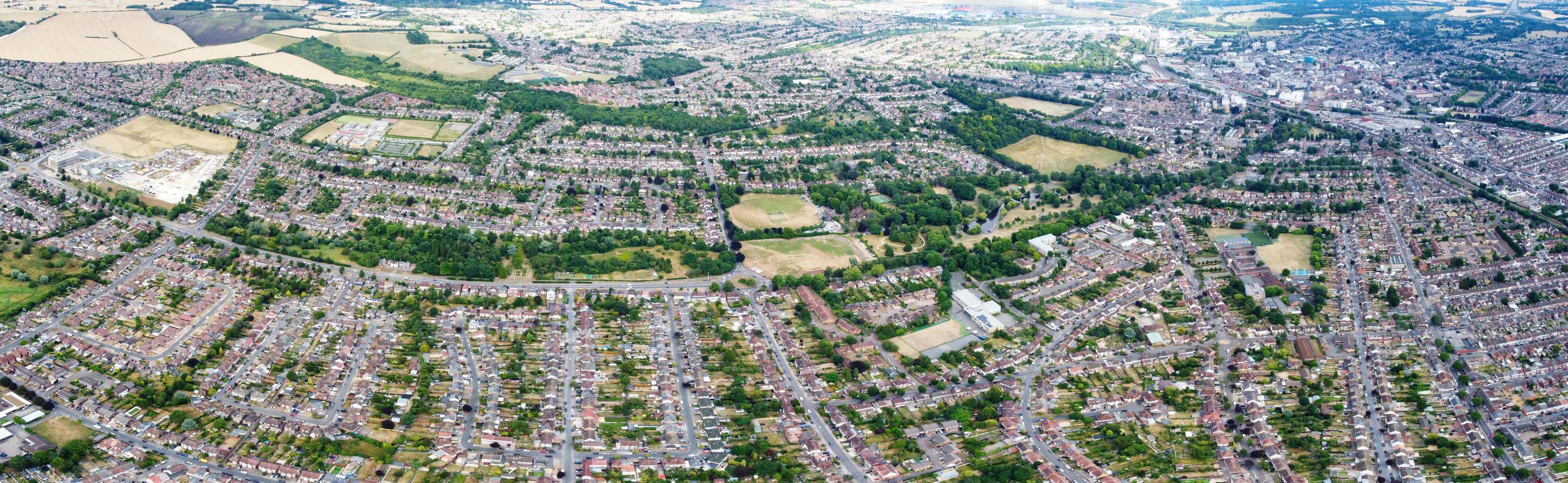 High Angle Panoramic Footage Houses and Buildings at London Luton Town and Aerial view of Railway Station of Leagrave photo