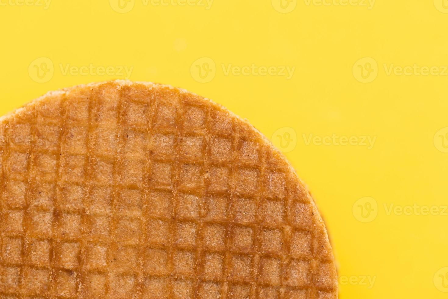 Stroopwafel On Yellow Background photo