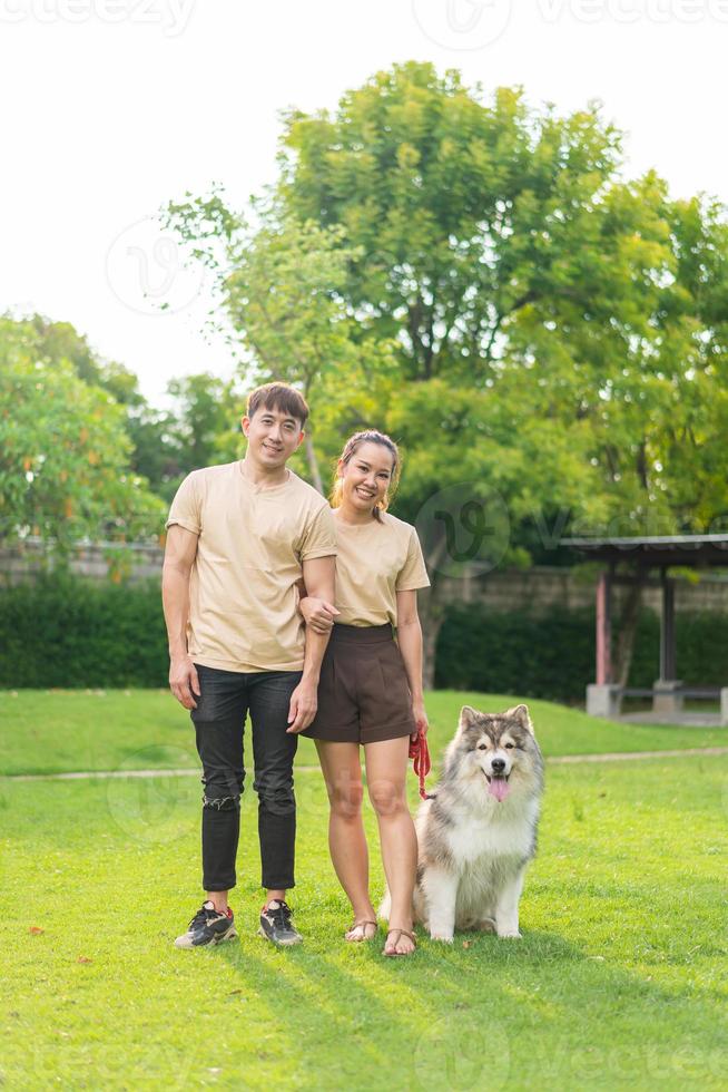 Asian couple love with dog photo