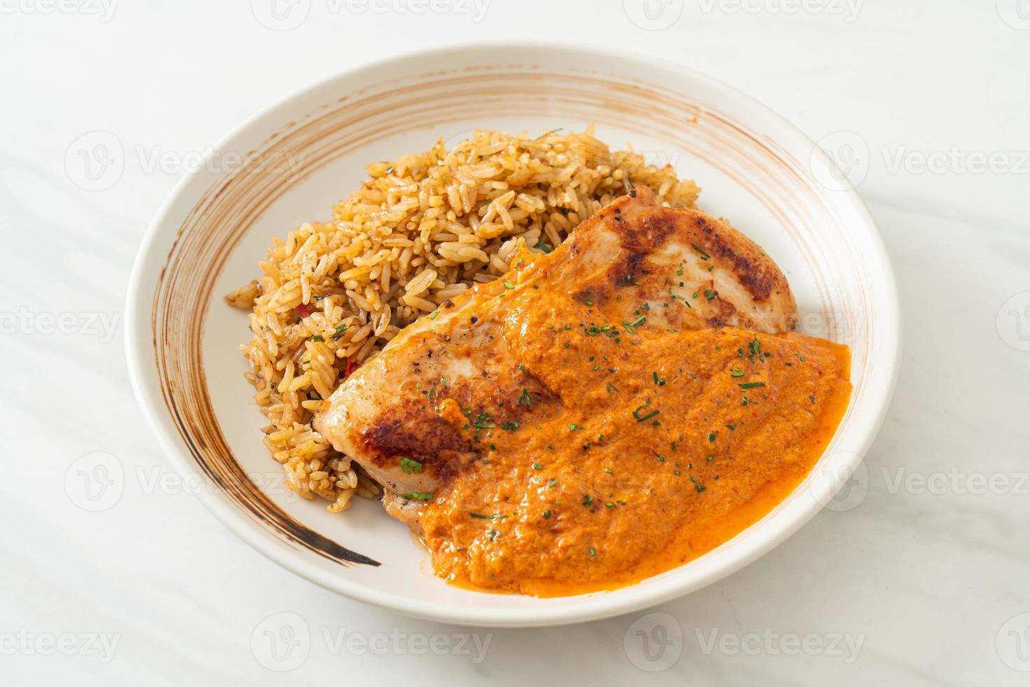 grilled chicken steak with red curry sauce and rice photo
