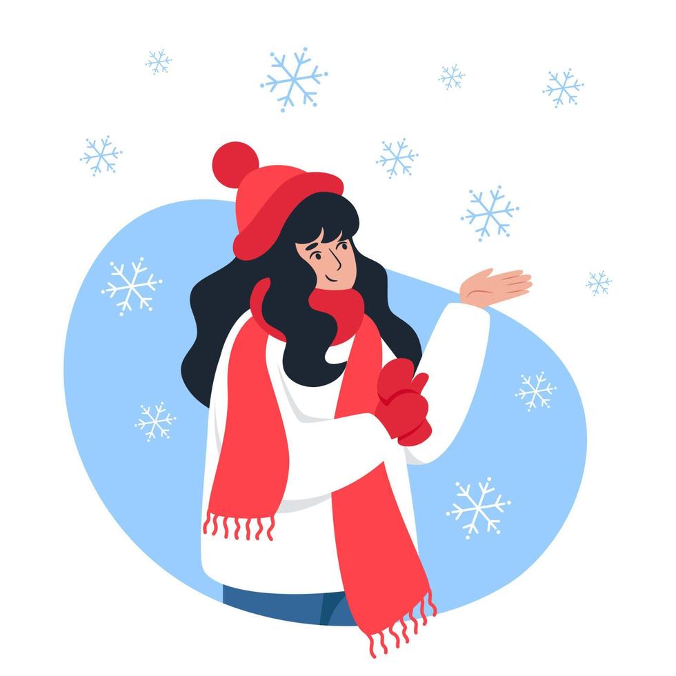 mujer atrapa copos de nieve con la mano vector