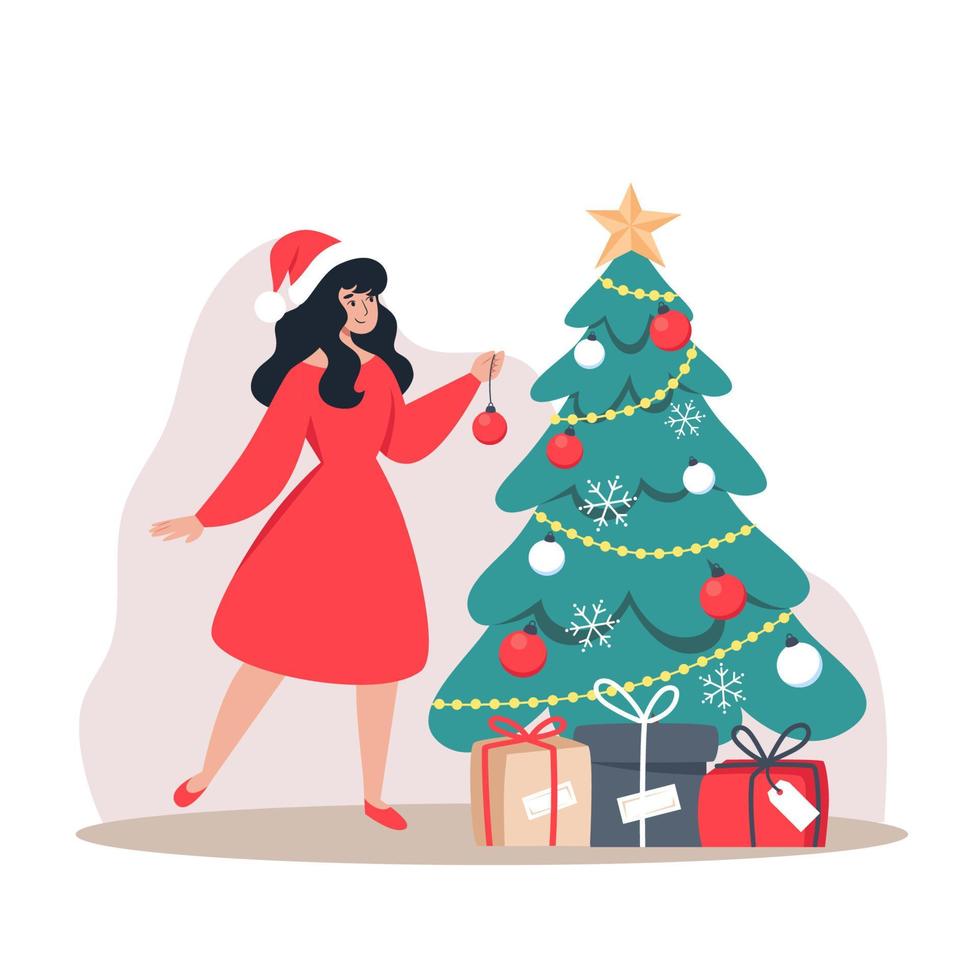 chica en vestido rojo decora el árbol de navidad vector