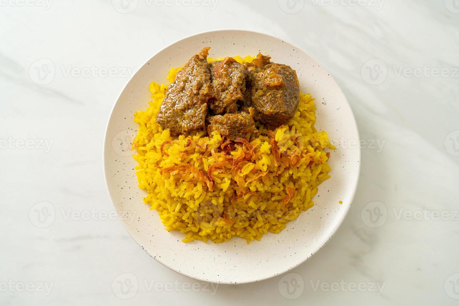 Beef Biryani or Curried rice and beef - Thai-Muslim version of Indian biryani, with fragrant yellow rice and beef photo