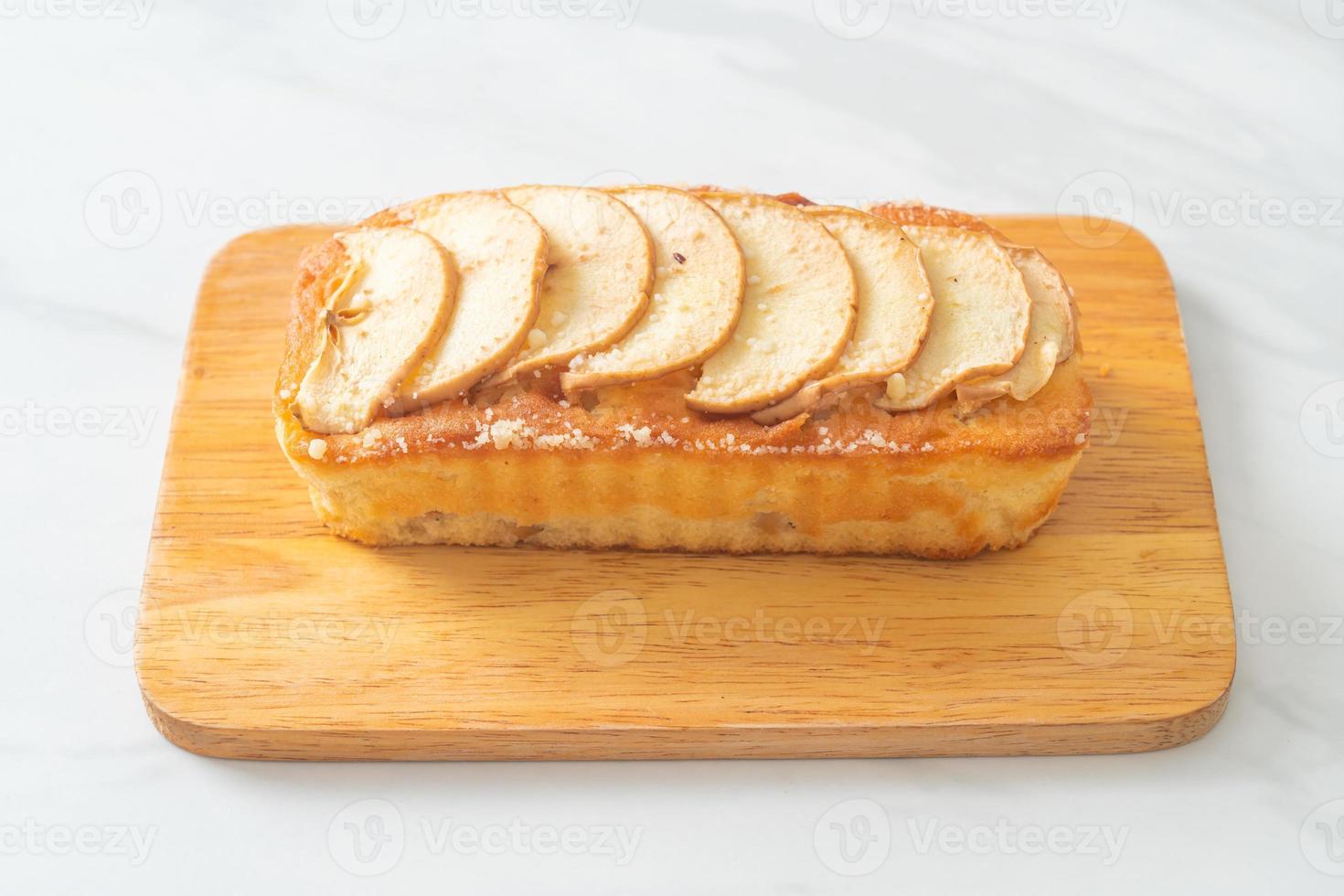apple loaf crumbled on wood board photo