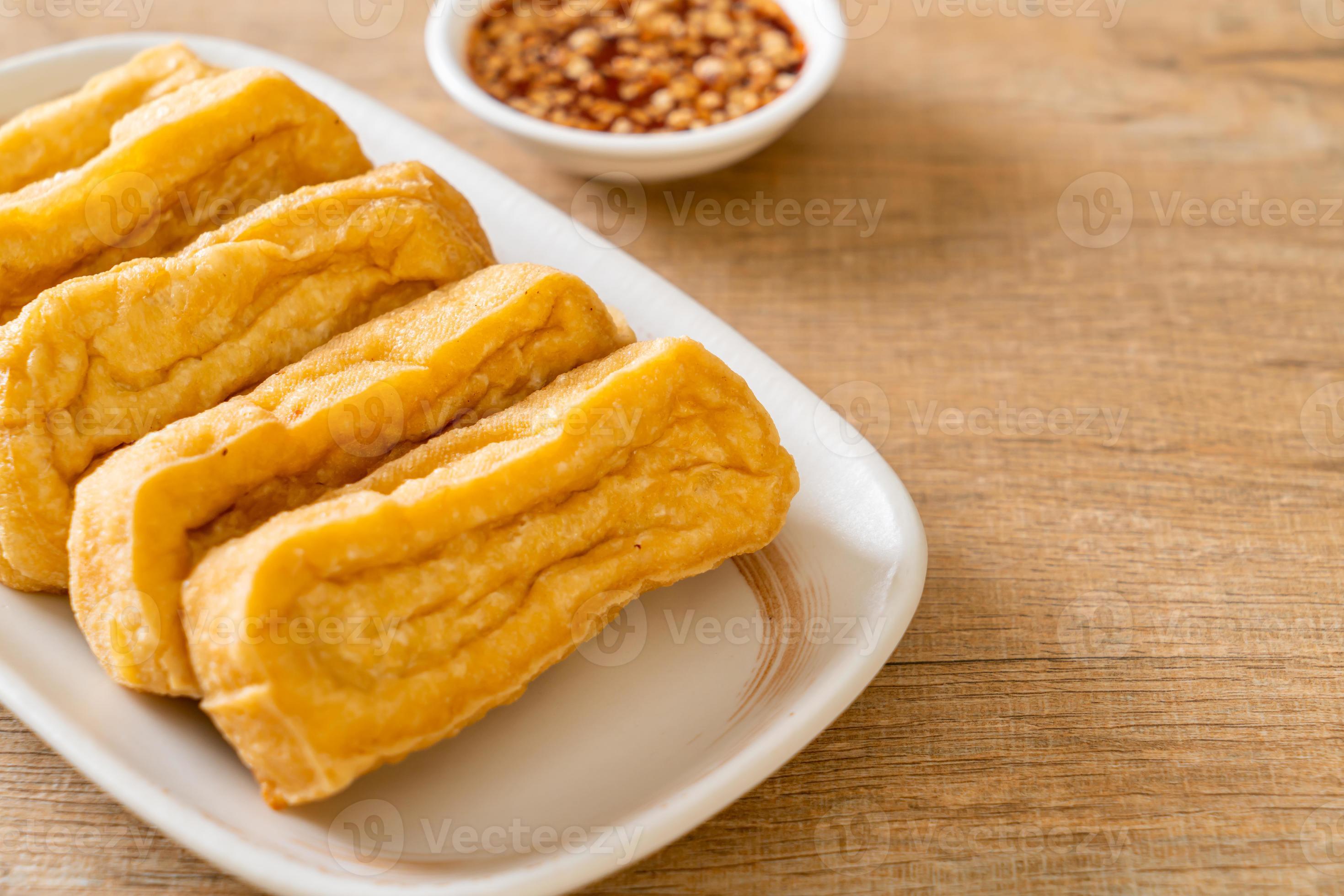 fried tofu with sauce 10195232 Stock Photo at Vecteezy