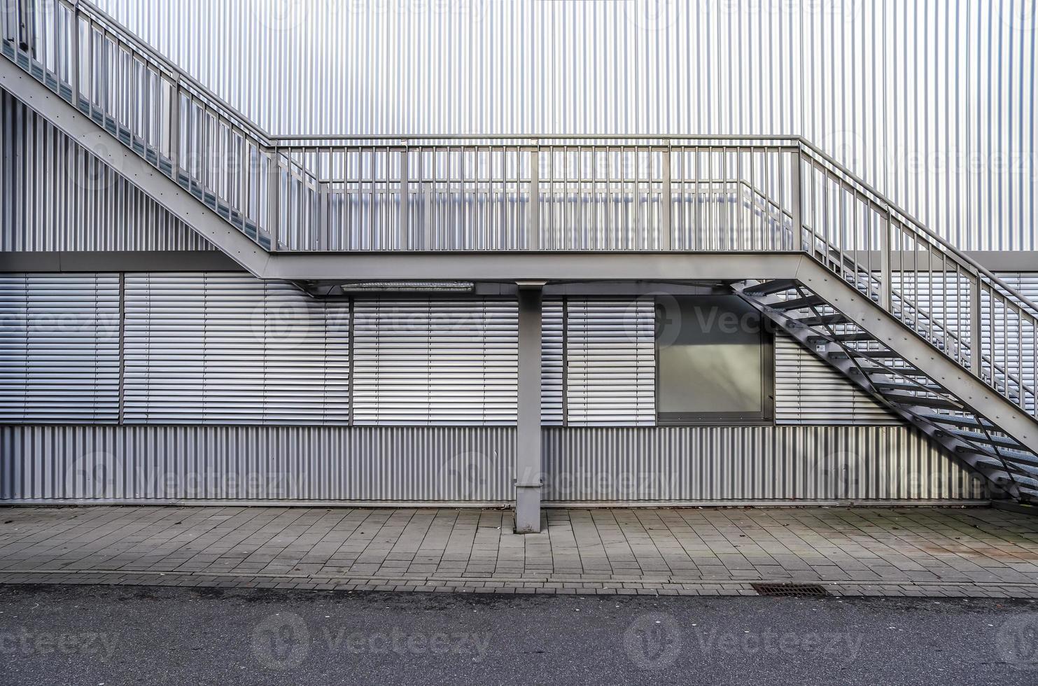 Close up view on metallic stairs at a modern architecture building. photo