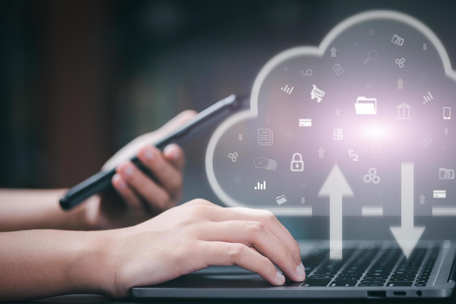Cloud technology concept and back up privacy database through highly secure communication network, woman using laptop to manage wireless internet data system on storage. photo