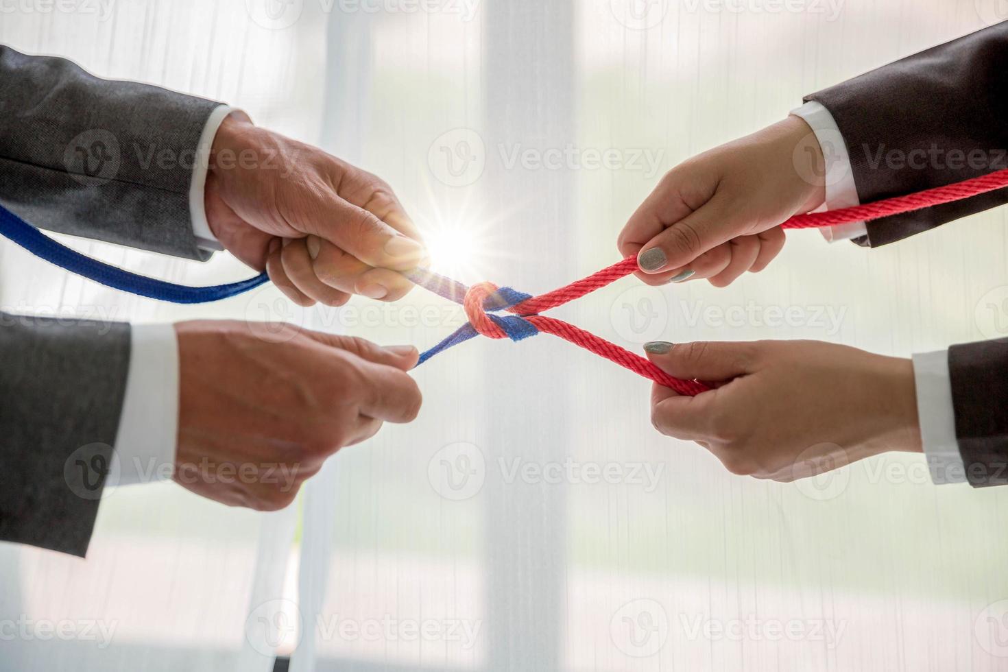 Teamwork businessman team, team people hold rope partnership, cooperation, concept. photo