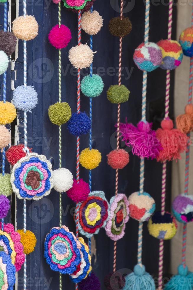 Decorative pompoms on the market in Cusco, Peru photo