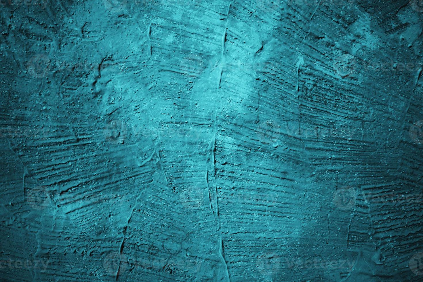 Abstract grunge blue stucco wall background. Dark stone wall concept background with space for text. photo