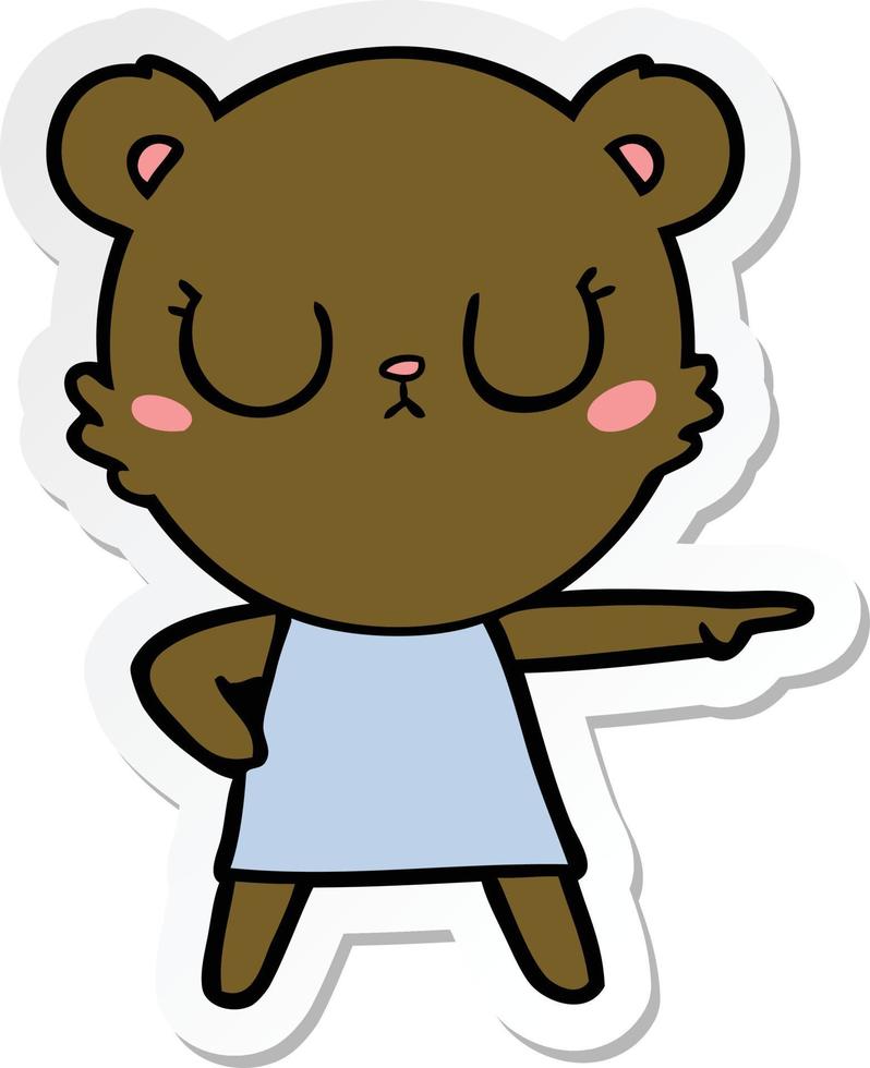 sticker of a peaceful cartoon bear in dress pointing vector
