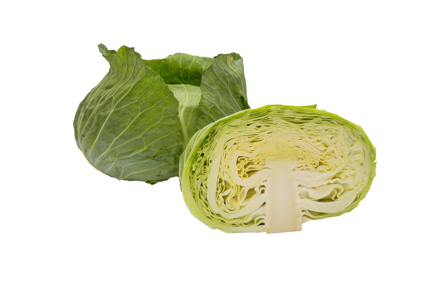 Closeup cabbage and cutted cabbage on wooden isolated white background photo