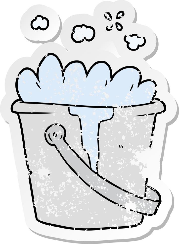 distressed sticker of a cartoon bucket of soapy water vector