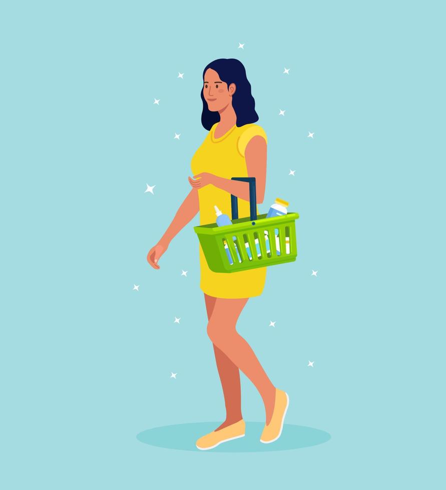 Young woman with shopping basket full of food and drinks in supermarket vector