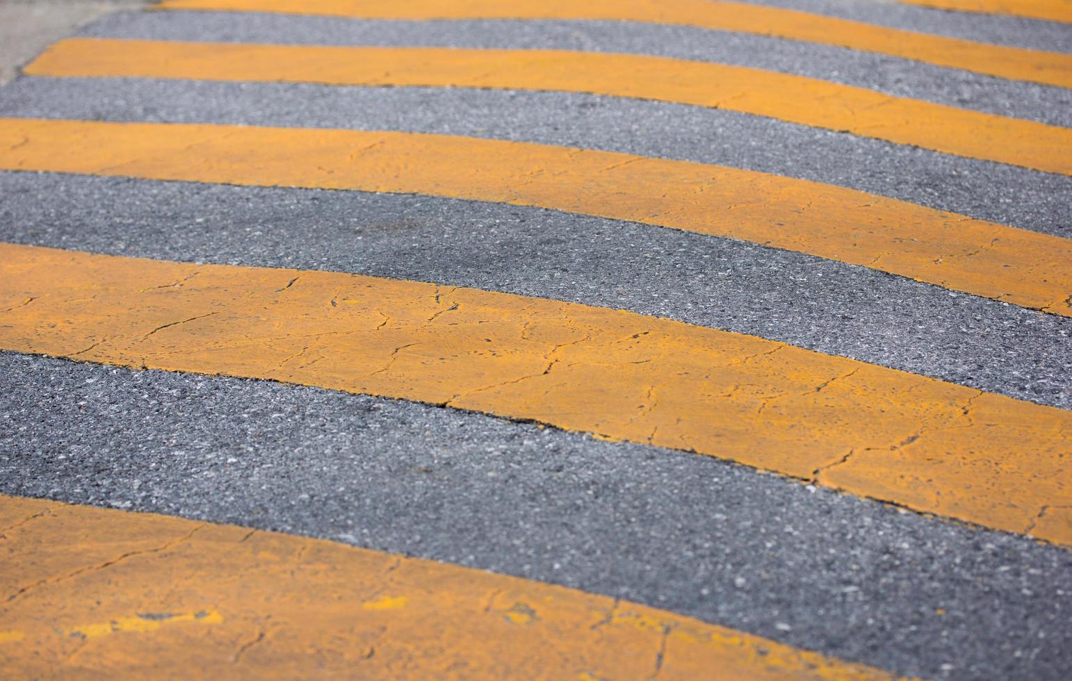 traffic safety speed bump on the road photo