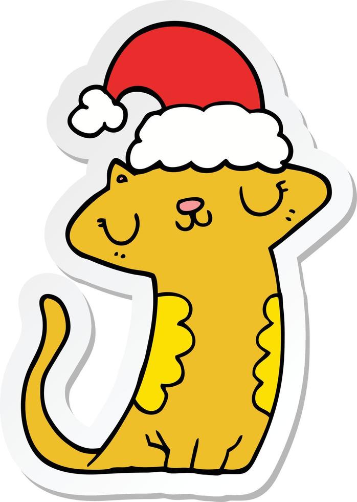 sticker of a cute cartoon cat wearing christmas hat vector