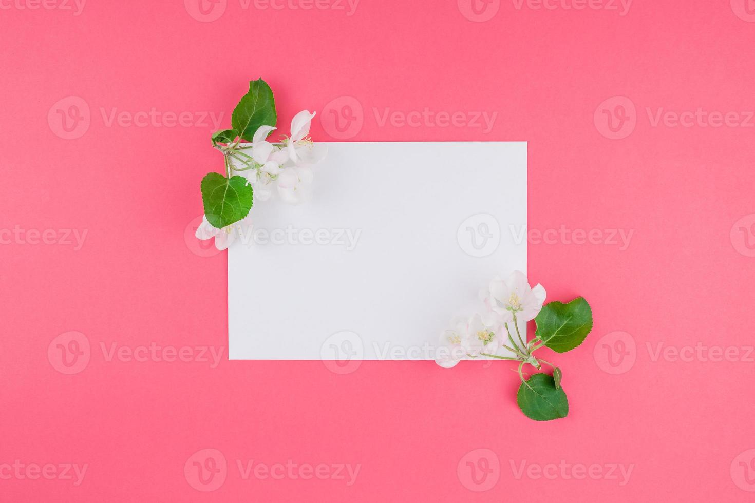 Blank frame mockup with white flowers photo