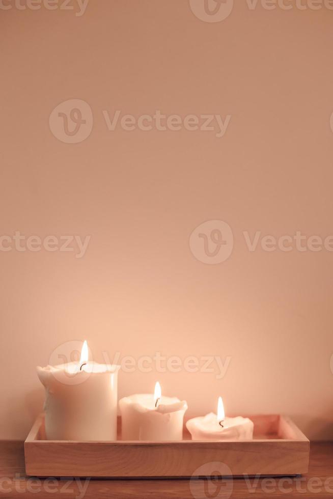 Candles lights in minimal hygge composition photo