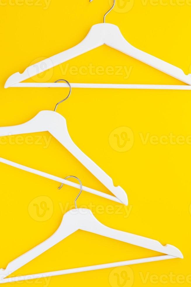 White hangers background for sale shopping concept photo
