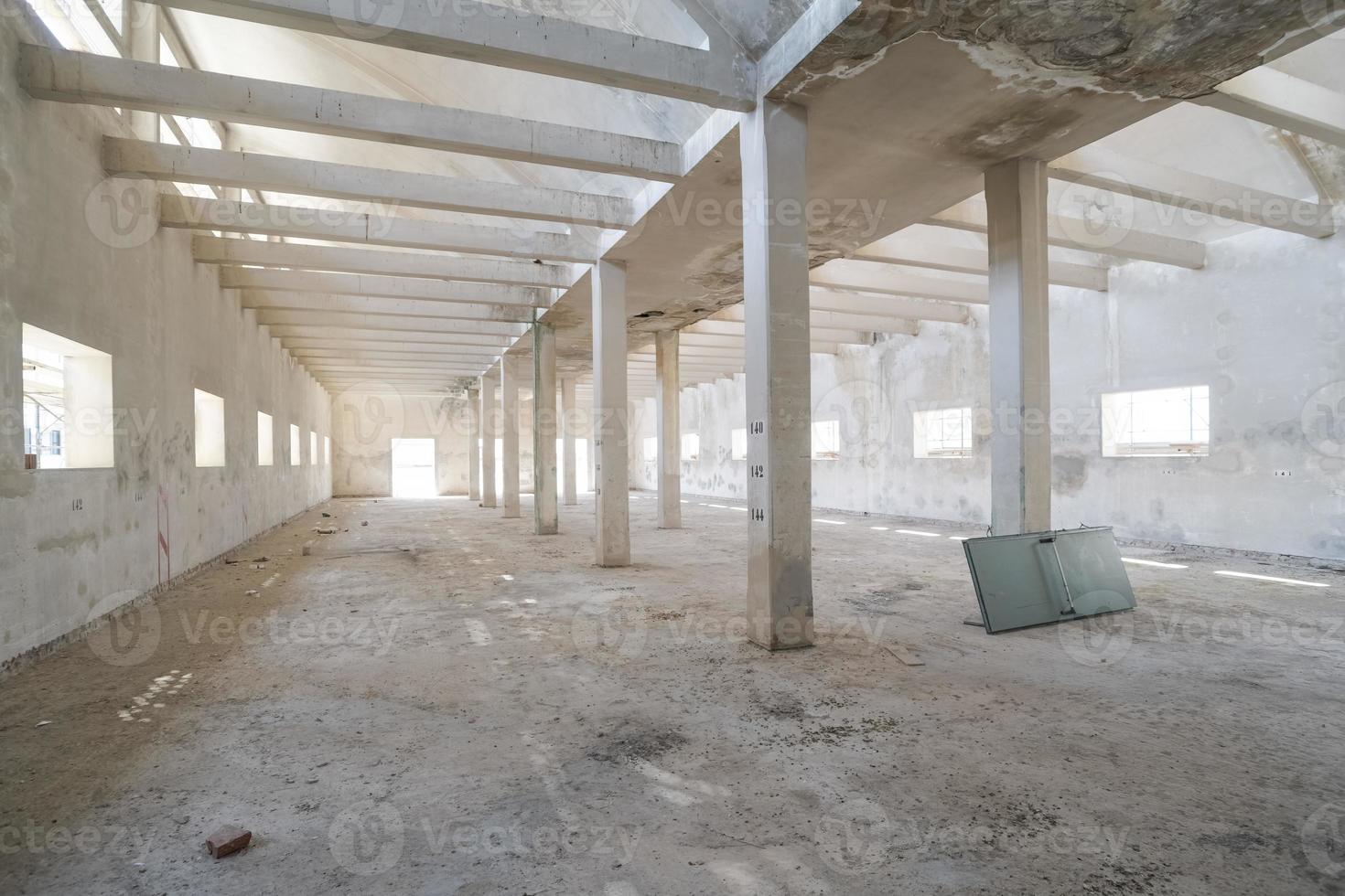 Old abandoned industrial building interior photo