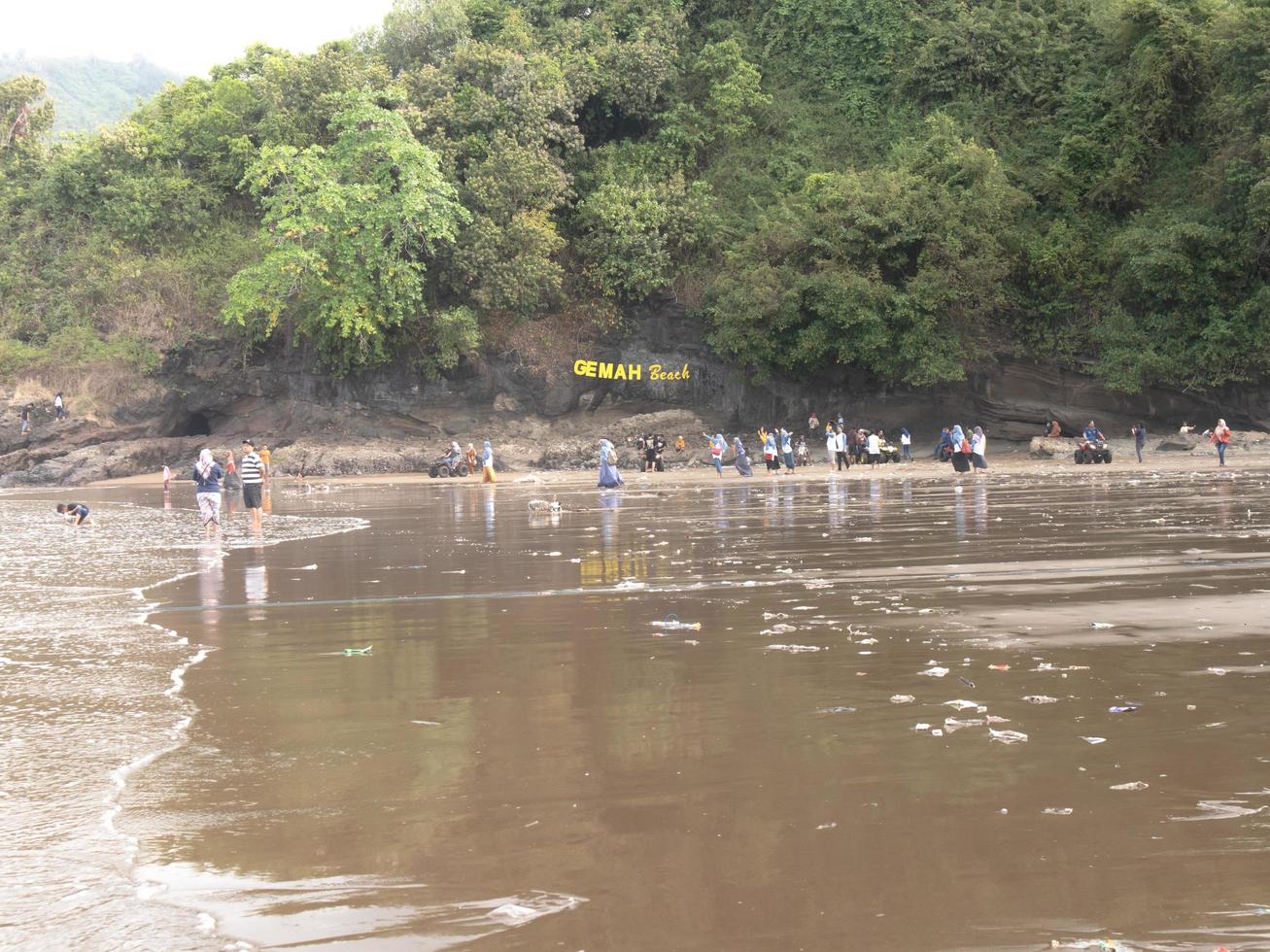 Tulungagung, Jawa timur, Indonesia, 2022 - Gemah beach atmosphere on holidays is very crowded photo