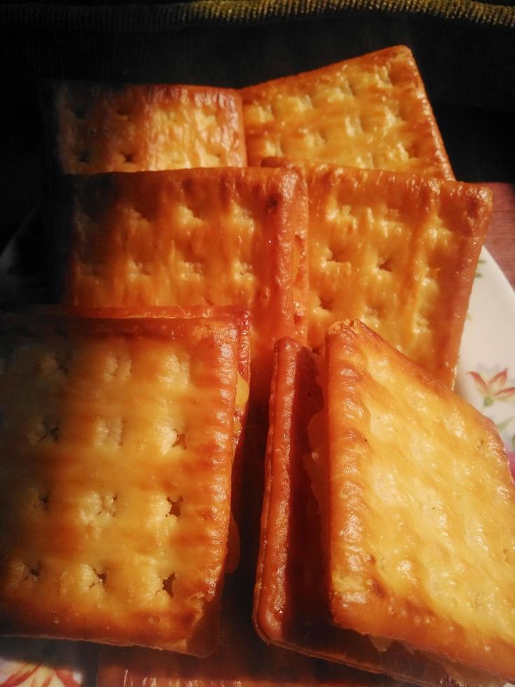 snack crackers filled with fermented cassava made by mother, for breakfast. photo